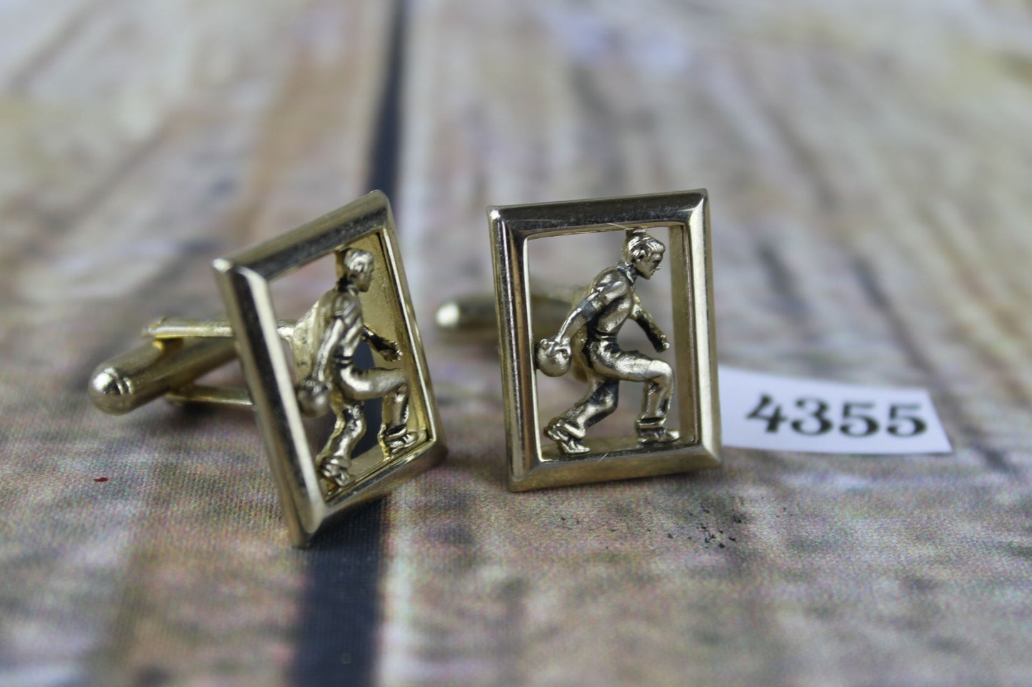 Vintage gold metal figure playing bowls in frame ten pin or crown green cuff links