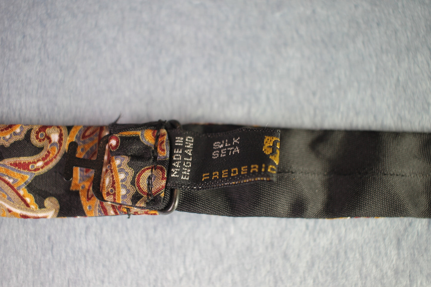 Vintage Frederick Theak silk self tie thistle end black gold paisley bow tie adjustable