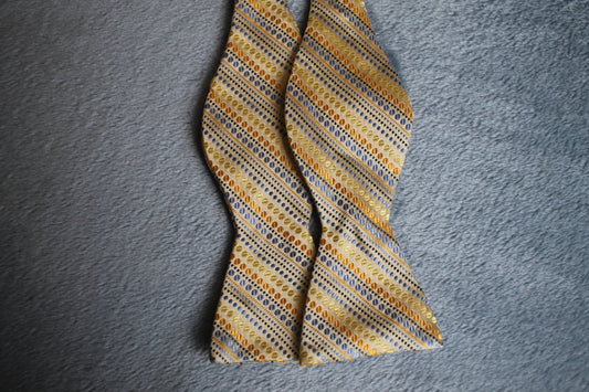 Vintage Bruno Piatelli self tie thistle end all silk gold bronze blue pattern bow tie