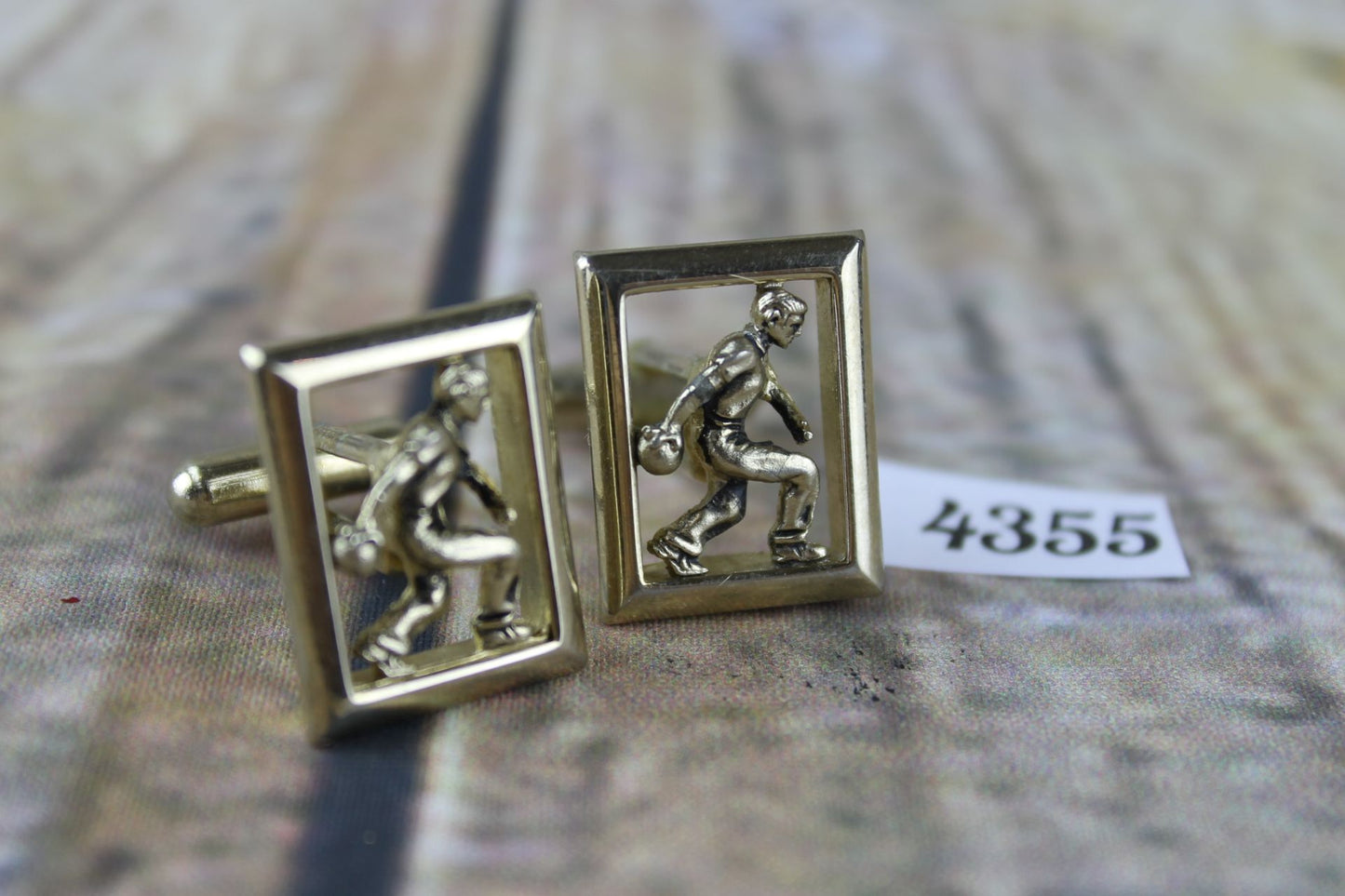 Vintage gold metal figure playing bowls in frame ten pin or crown green cuff links