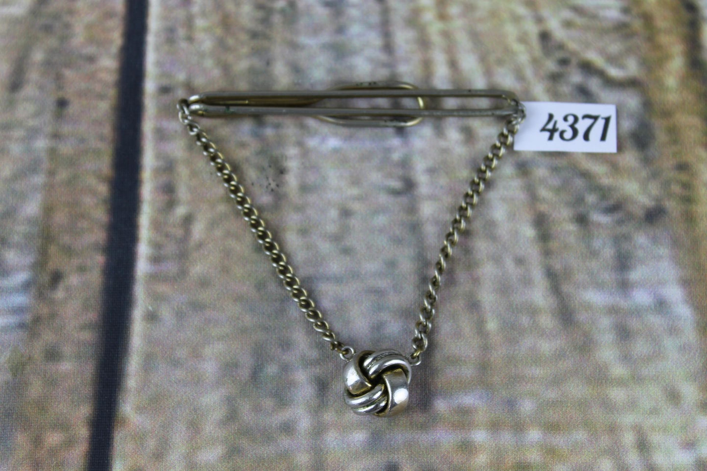 Vintage SWANK tie chain with hanging knot clip to shirt chain hangs over tie