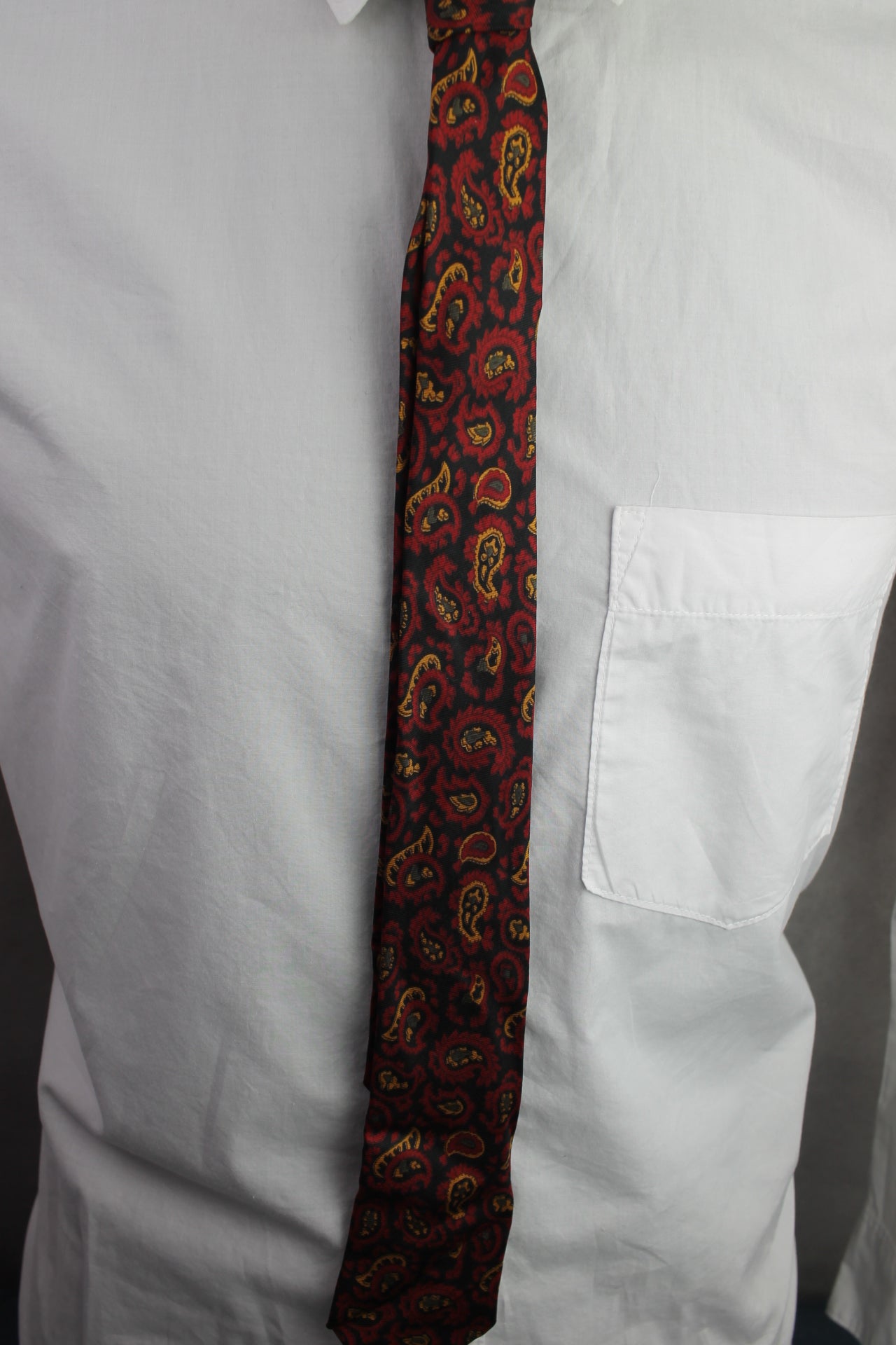 Vintage Sears black red orange paisley pattern swing tie