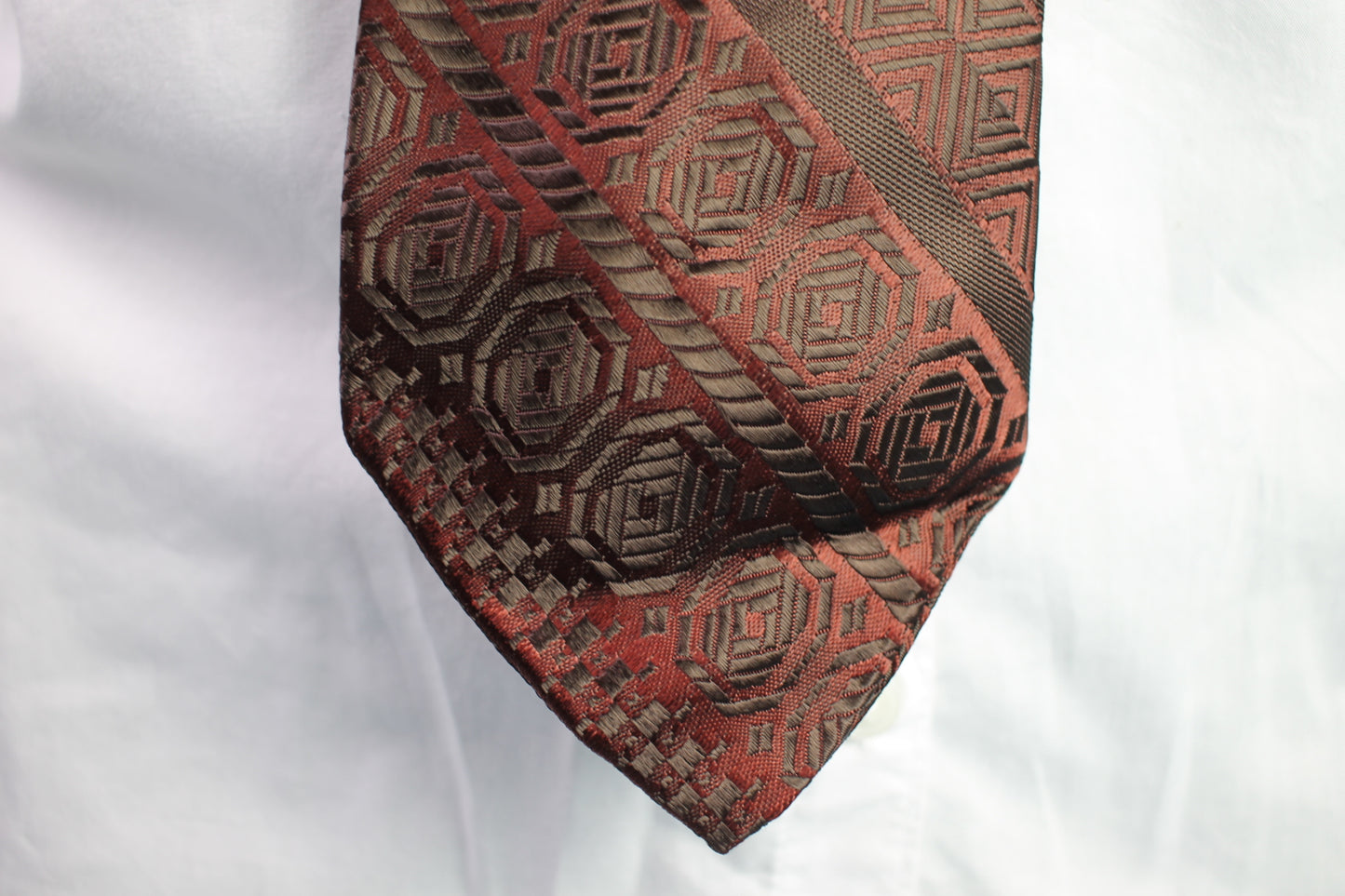 Vintage 1950s/60s dark red grey repeat pattern jacquard tie