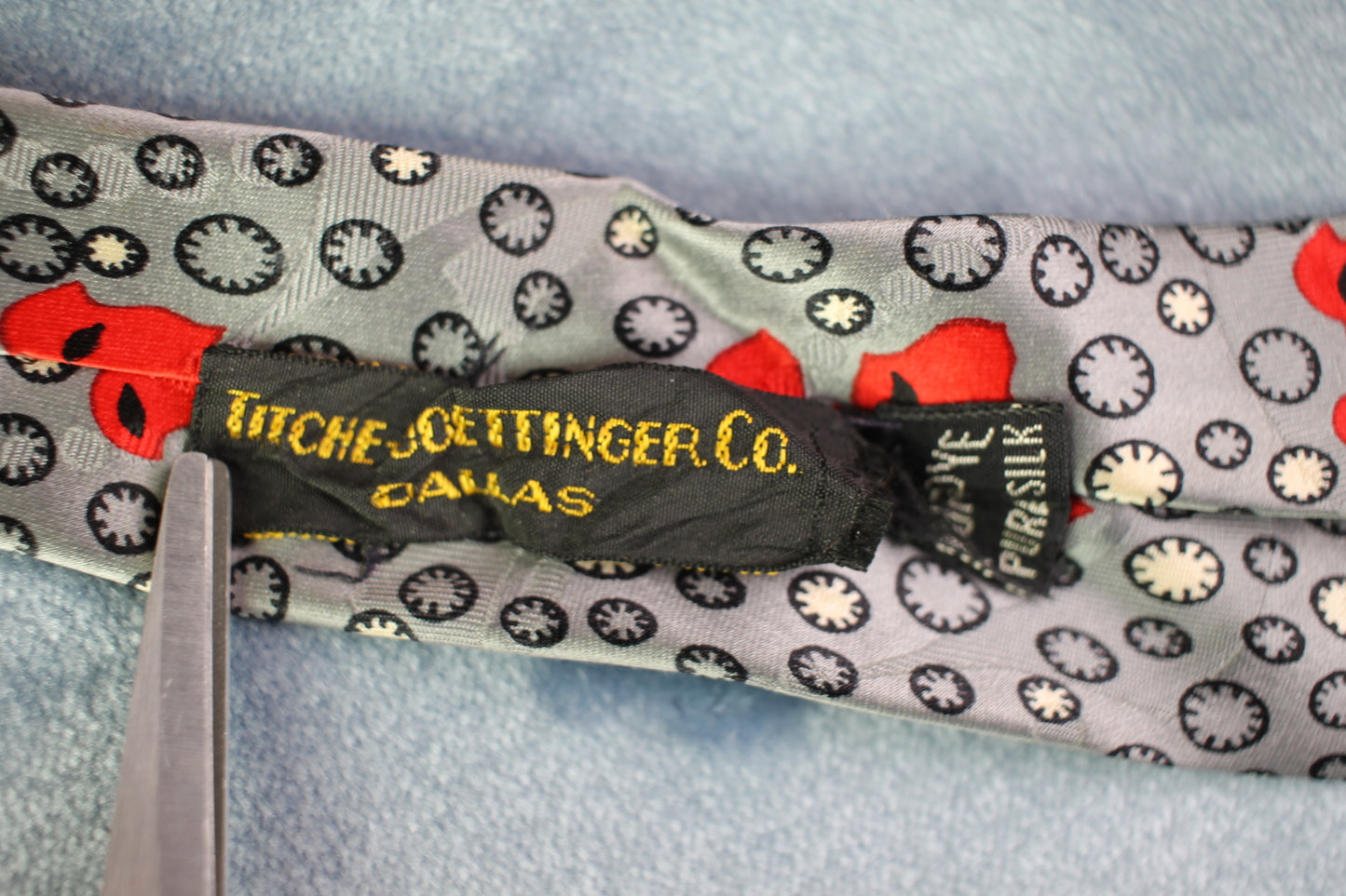 Vintage Titche Goettinger Co silver red white circles pattern tie