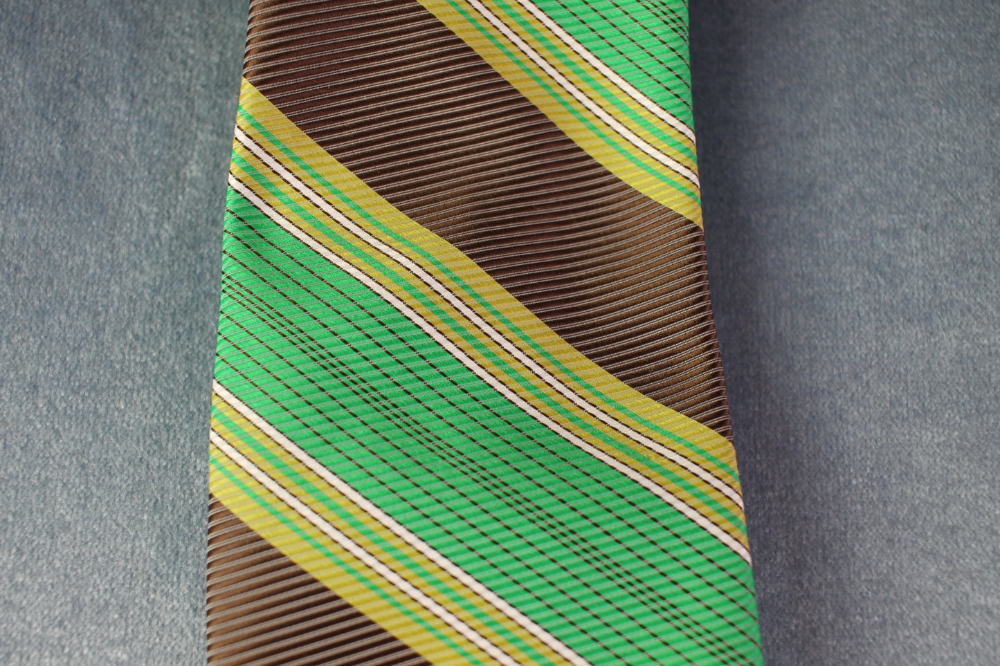 Vintage 1970s green brown white striped pattern kipper tie