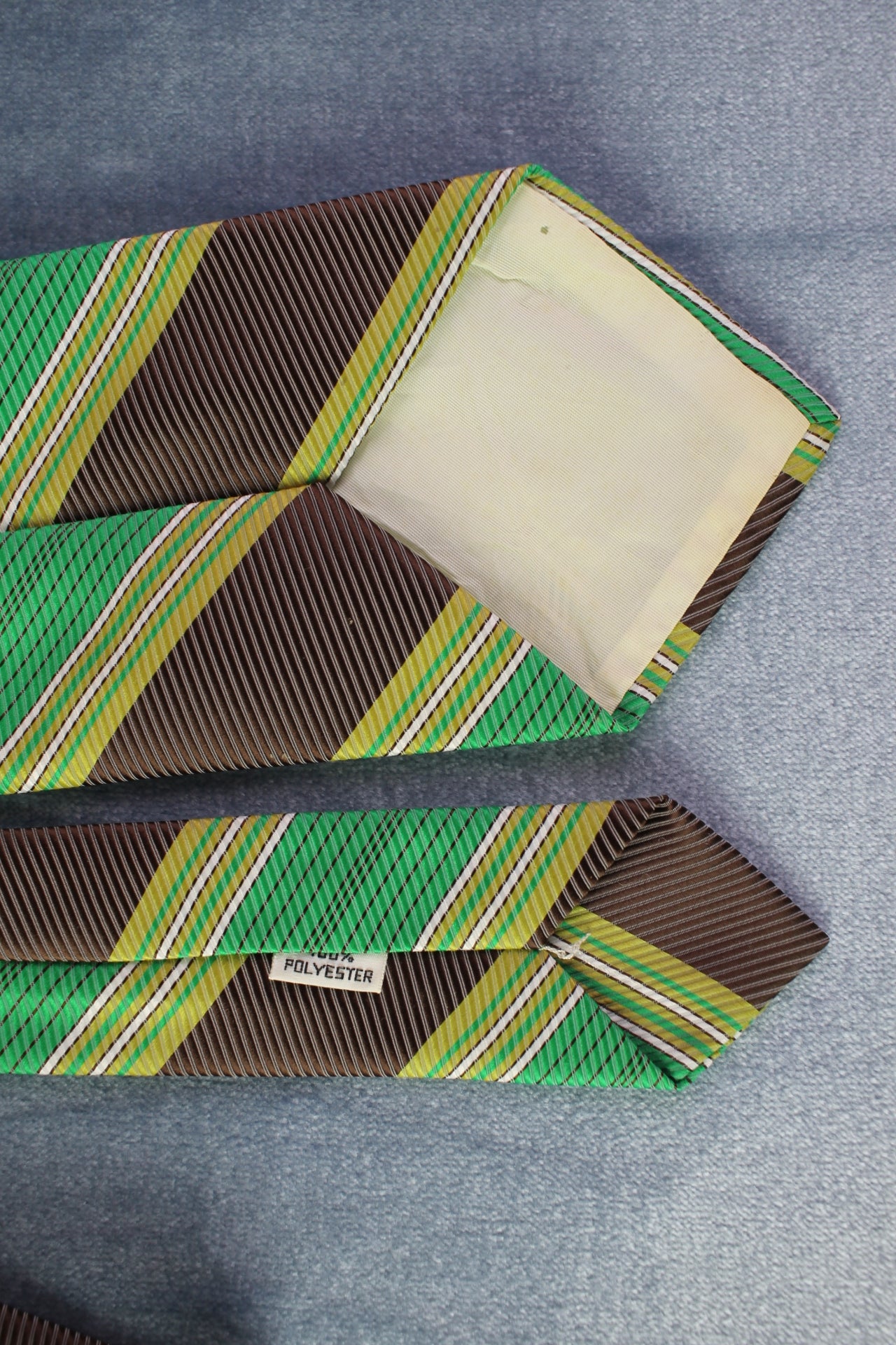 Vintage 1970s green brown white striped pattern kipper tie