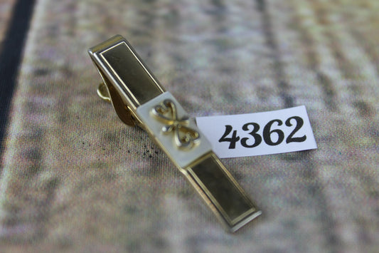 Vintage SWANK gold metal white lucite scrollwork design tie clip