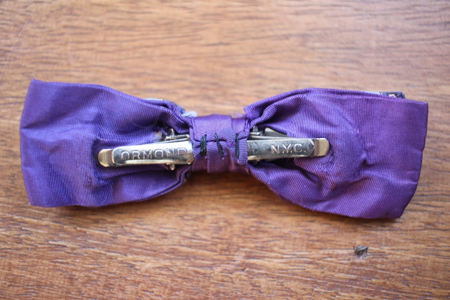Vintage pre-tied clip on blue red on purple background pattern bow tie
