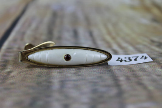 Vintage gold metal white lucite red diamante tie clip