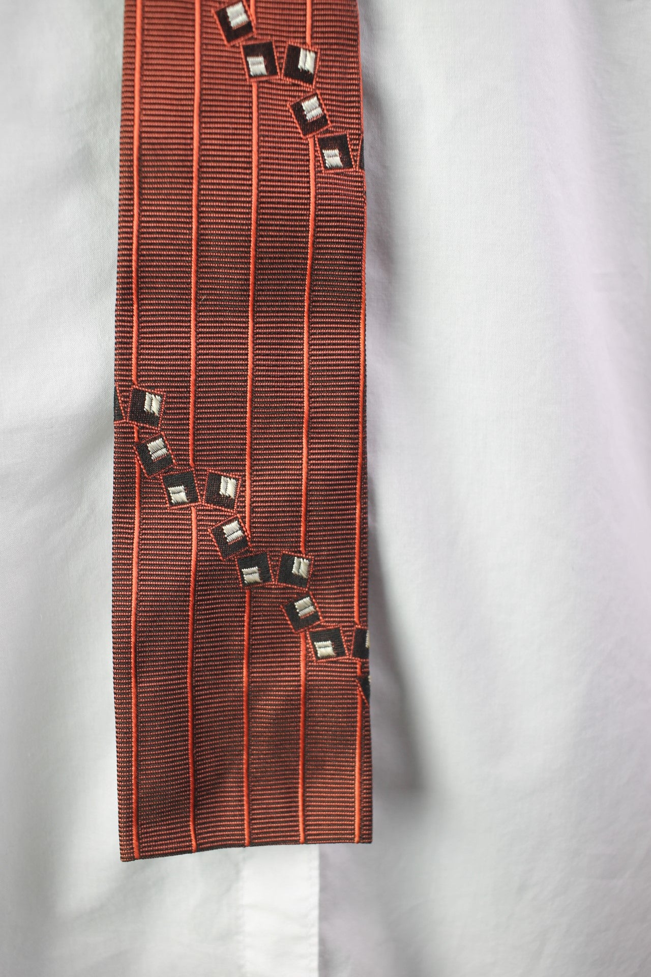 Vintage pink black striped pattern with square motifs square end skinny tie