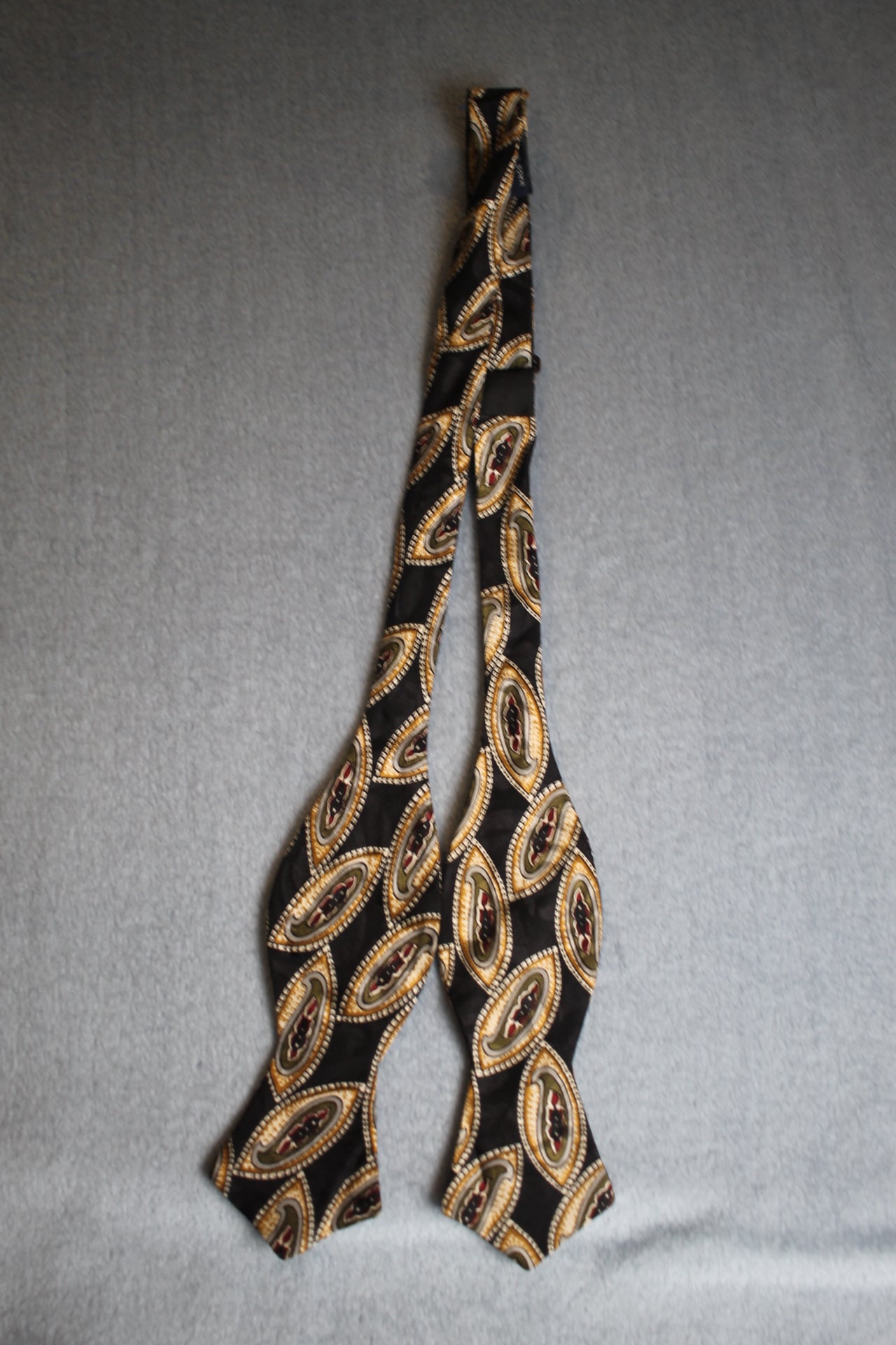Vintage R Hanauer self tie thistle end all silk black gold red pattern bow tie adjustable