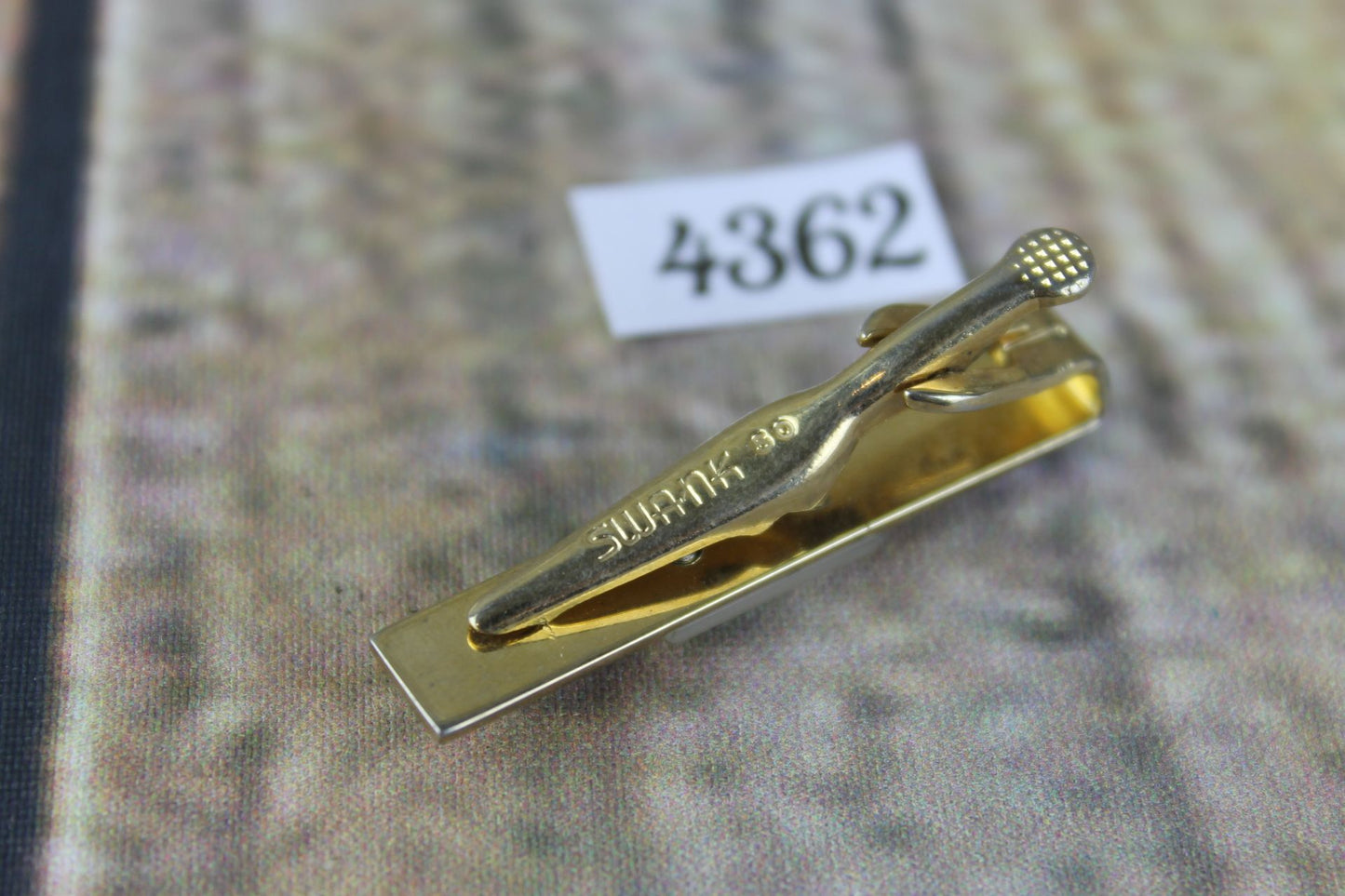 Vintage SWANK gold metal white lucite scrollwork design tie clip
