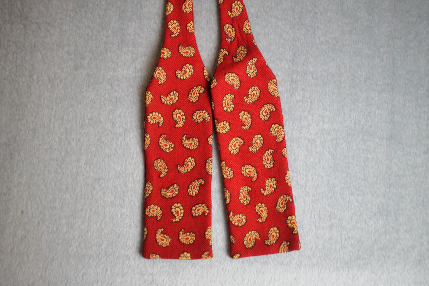 Vintage The Adapta London self tie paddle end red paisley pattern bow tie