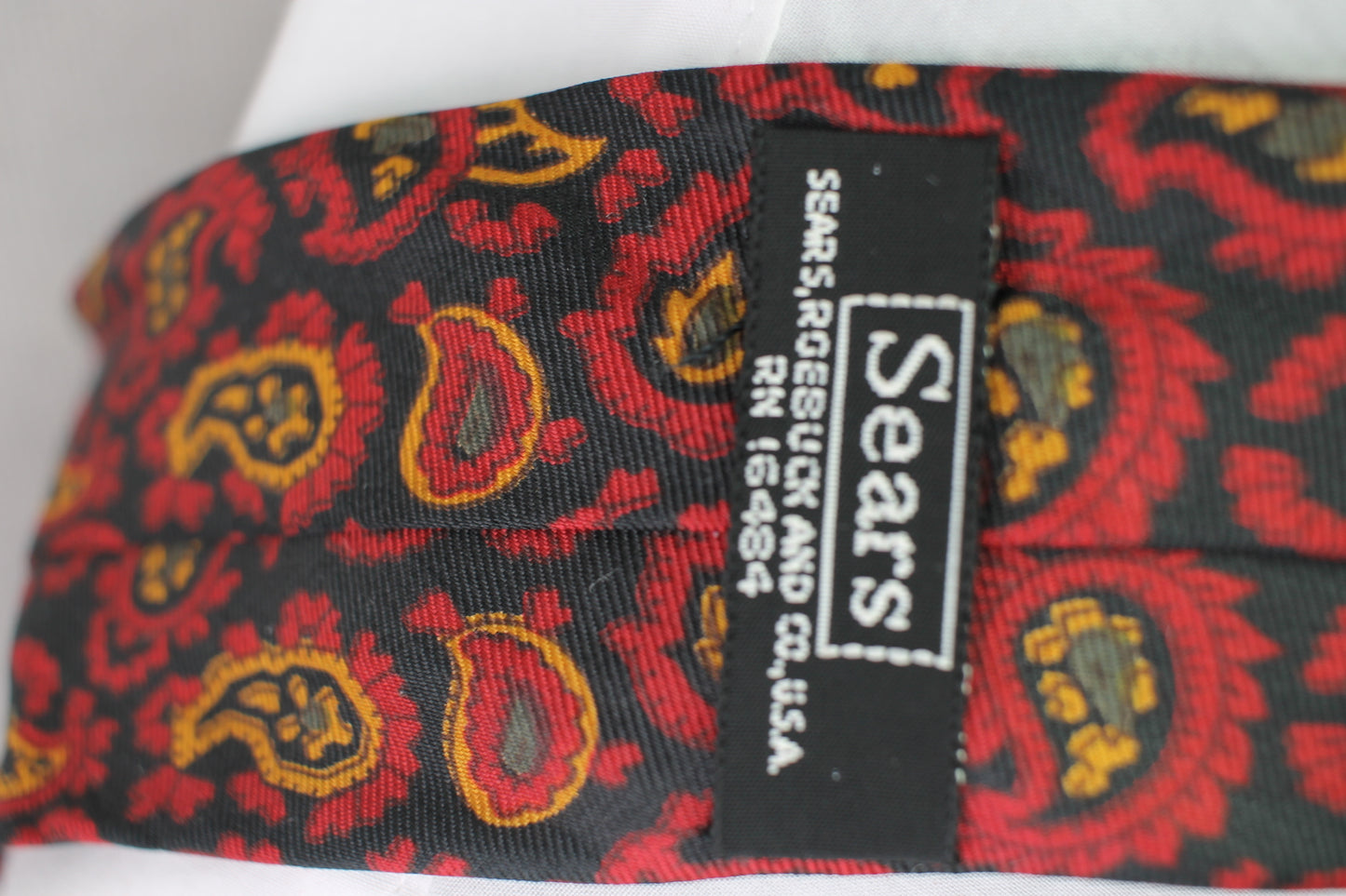 Vintage Sears black red orange paisley pattern swing tie