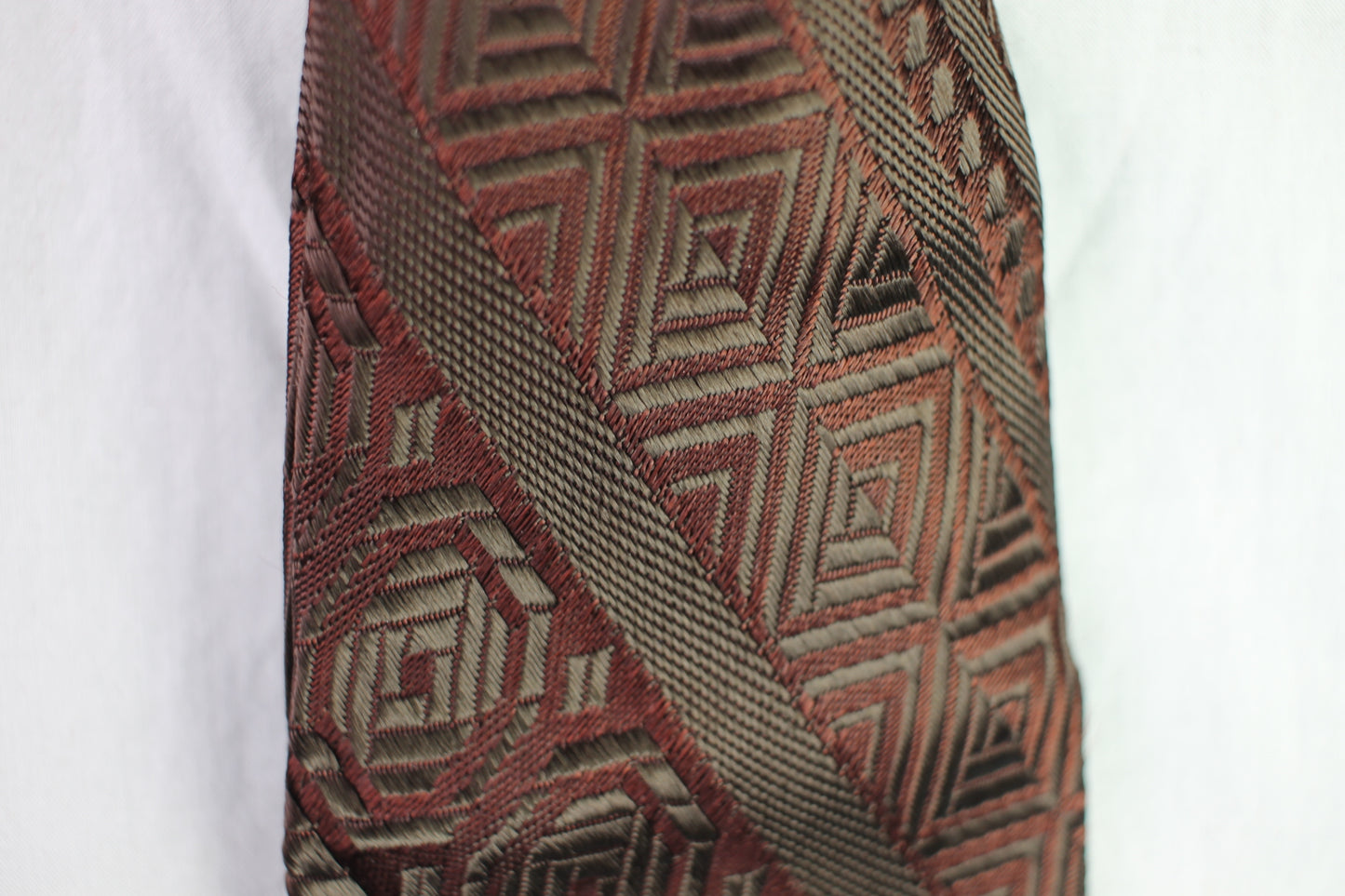 Vintage 1950s/60s dark red grey repeat pattern jacquard tie