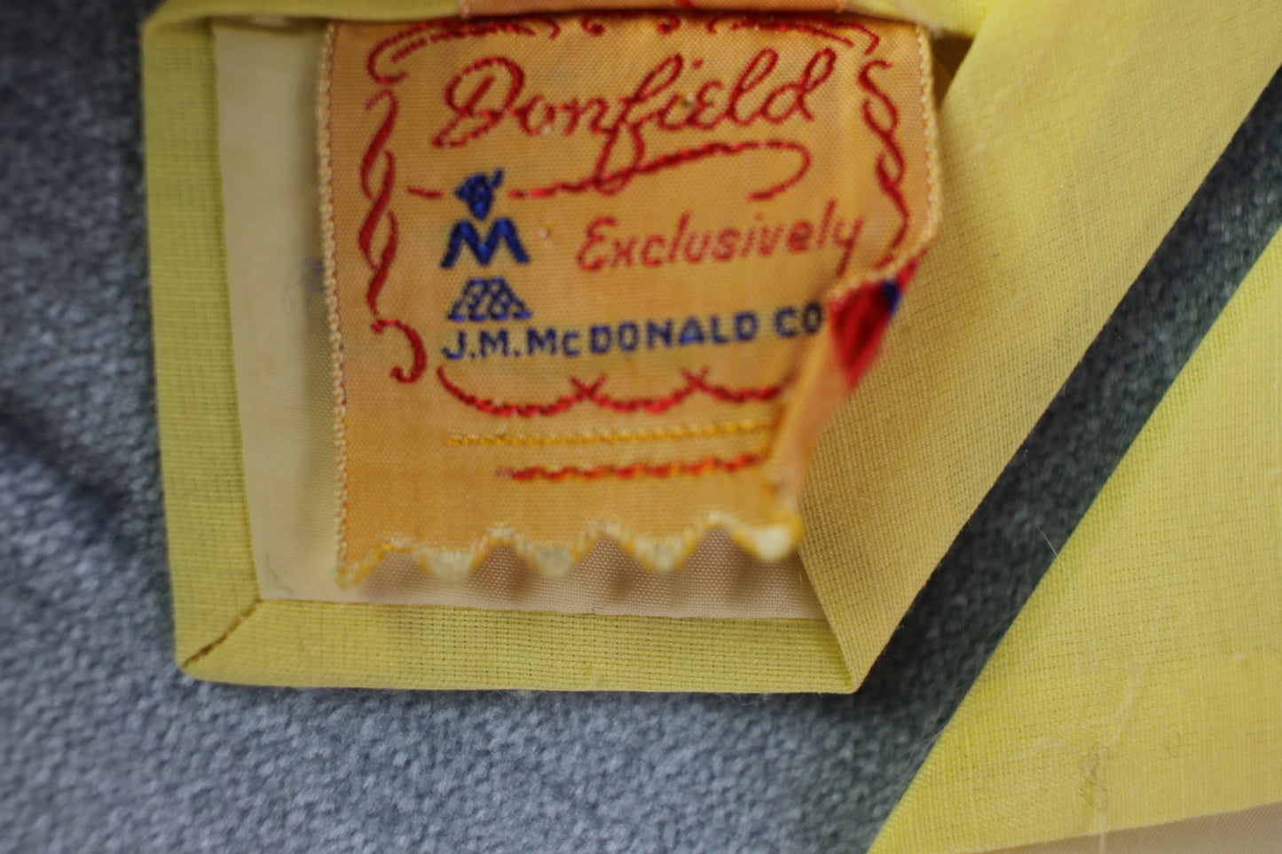 Vintage Donfield 1940/50s lemon coloured blue horse head tie