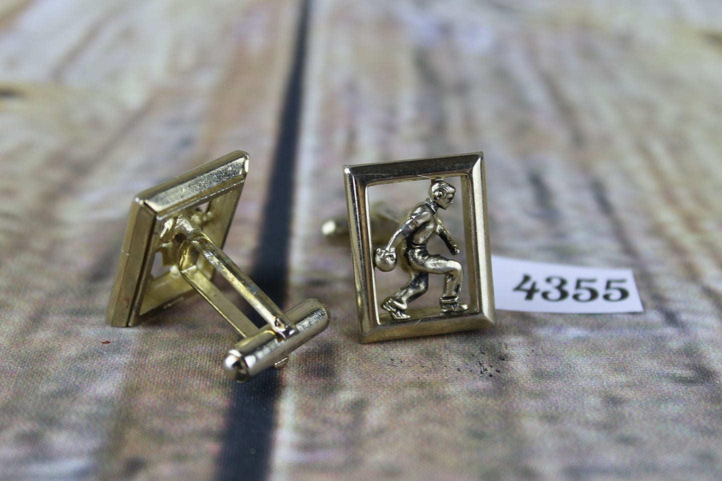 Vintage gold metal figure playing bowls in frame ten pin or crown green cuff links