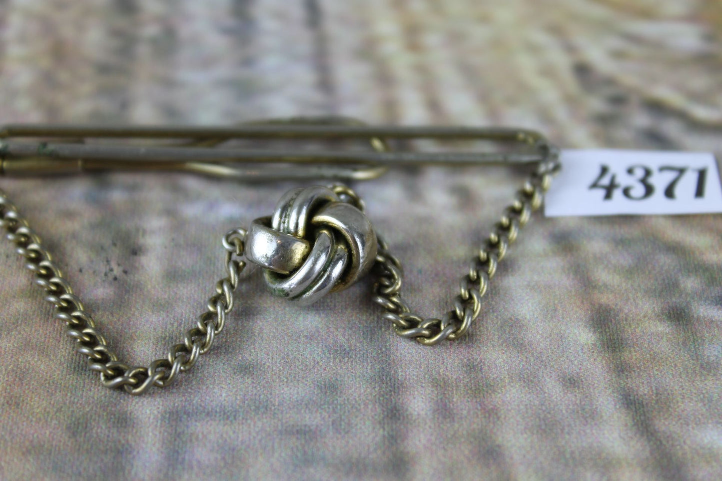 Vintage SWANK tie chain with hanging knot clip to shirt chain hangs over tie